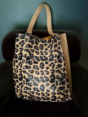 Y2K Barney’s New York Leopard Print Tote Bag with camel color accents.
